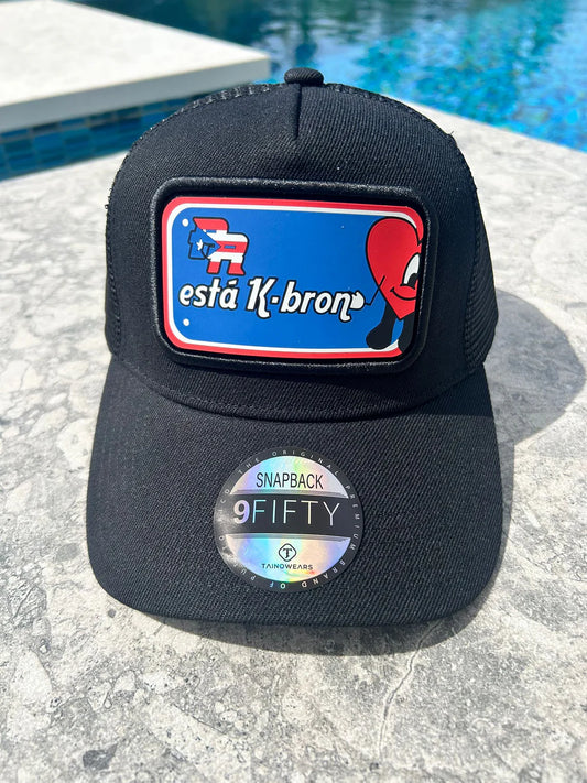 Silicone PR Plate Trucker Hat - Puerto Rican Flag & "Puerto Rico Está K-Brón" Black Mesh Snapback Tainowears